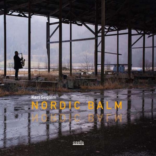 Nordic Balm cover, a silhouette of a saxophone player (Karl Seglem) in an industrial setting, outdoors, possibly in an old factory