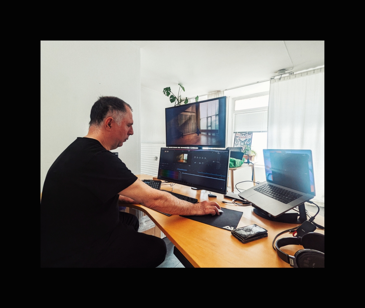 Pierluca Taranta editing video in his studio