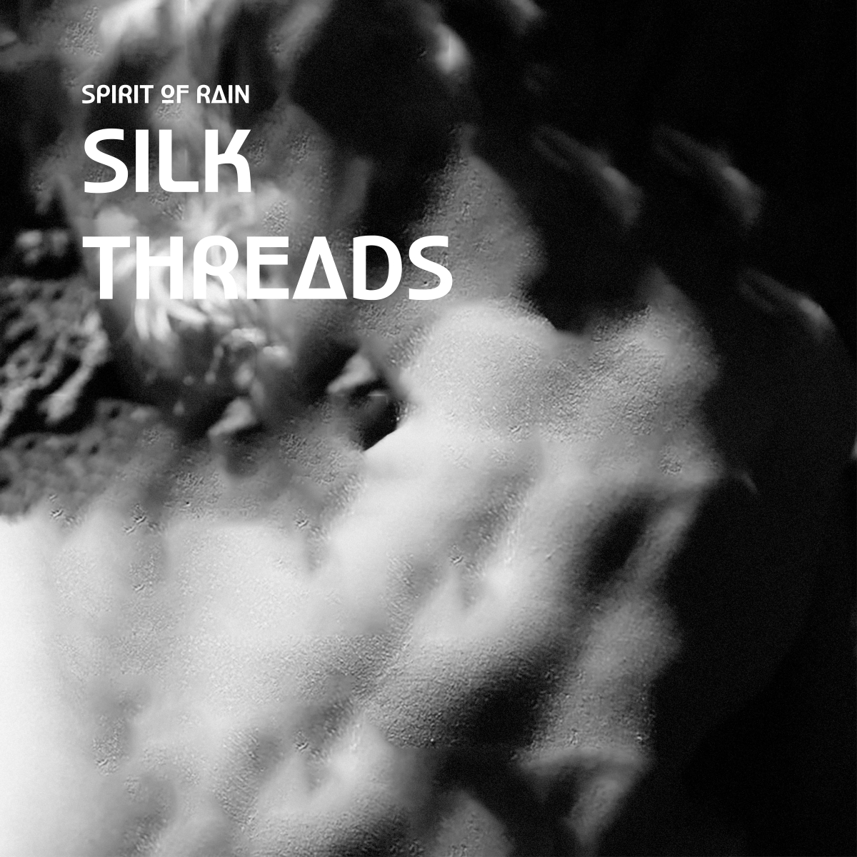 Black and white image, very abstract, front cover for the track Silk Threads. 