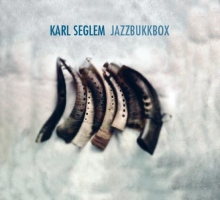 Goat horn instruments on display, front cover for Jazzbukkbox
